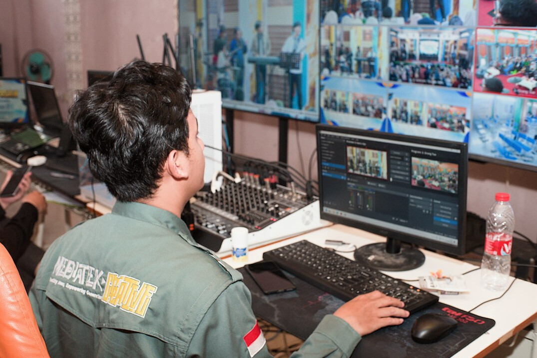 store security guard watching monitors