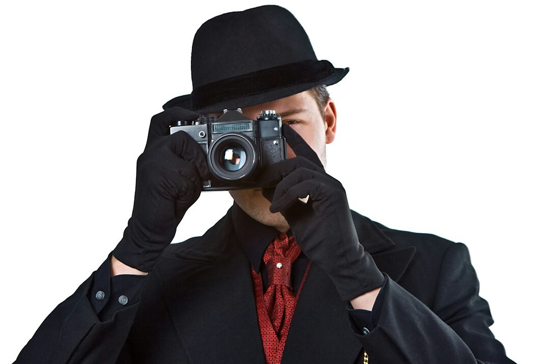 detective reviewing security footage