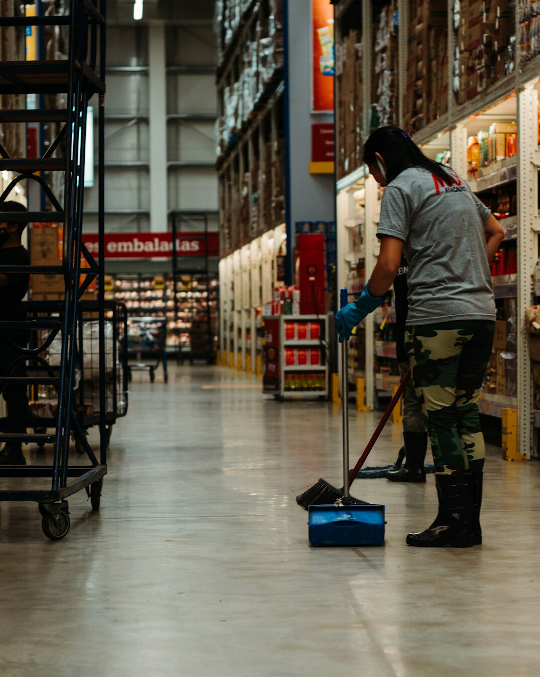 retail employee checking inventory