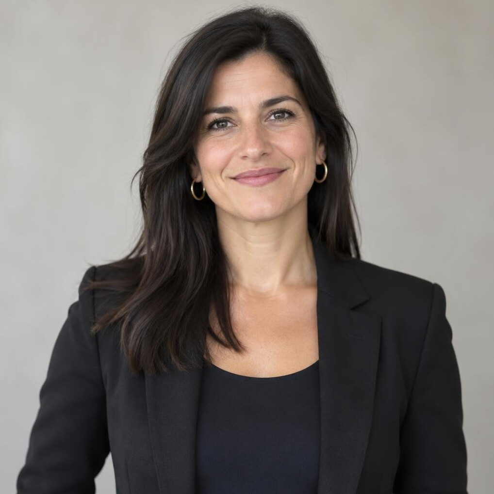 Portrait of a smiling Latina woman editor